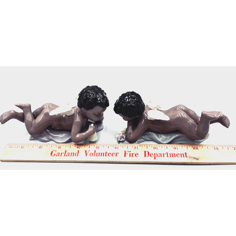 2 Cherub Angel Brown Babies Figurines Laying Down Pastel Glazed Porcelain Shiny